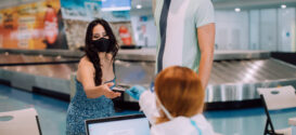 Masked Travelers At SJU Airport
