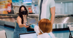 Masked Travelers At SJU Airport