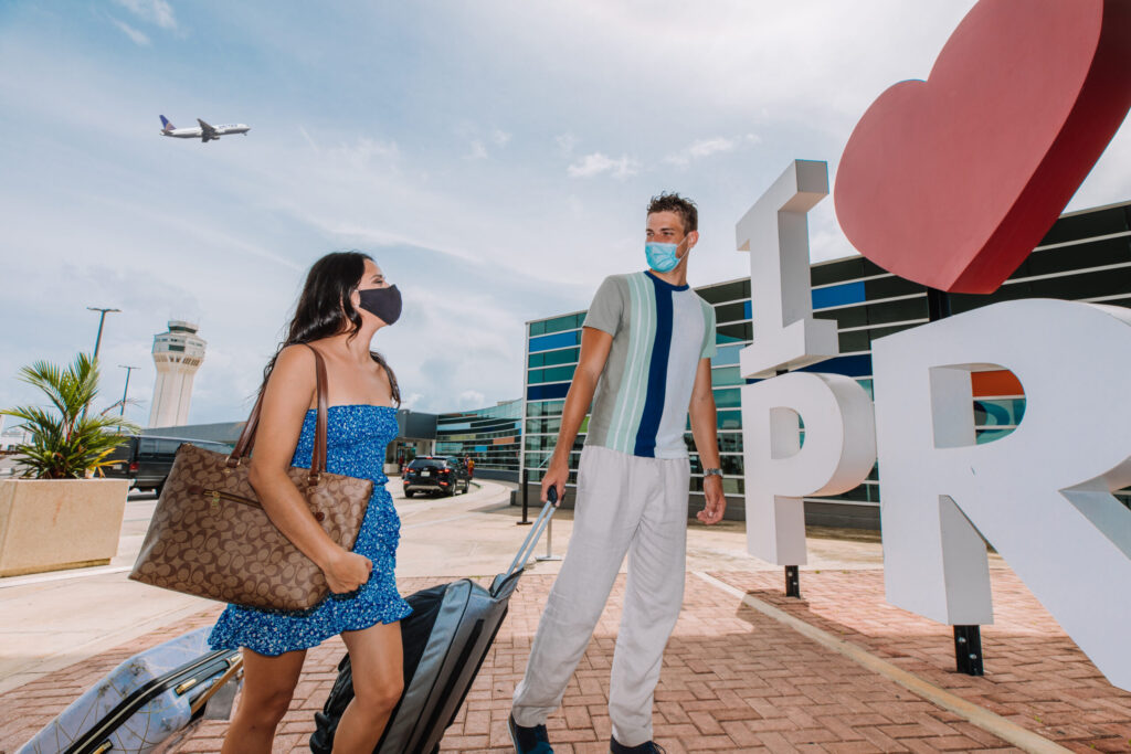 Travelers At SJU Airport 