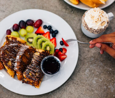 French toasts, fruits and coffee