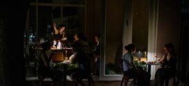 SAN JUAN, PUERTO RICO - APRIL 16: People have dinner at chinese restaurant Santurce during a massive power blackout that affected the entire island on April 16, 2025 in San Juan, Puerto Rico. The cause of the electricity outage is being investigated after all 1.4 million residents of the island lost power on Wednesday. (Photo by Jose Jimenez/Getty Images)